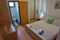 Posteľ alebo postele v izbe v ubytovaní Apartment Summer Day
