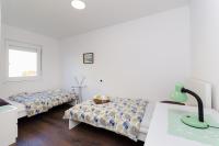 Posteľ alebo postele v izbe v ubytovaní Apartments Zoran