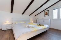 Posteľ alebo postele v izbe v ubytovaní Apartments Zoran