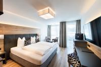 Televízia a/alebo spoločenská miestnosť v ubytovaní Hotel Modern Mountain