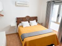 Postel nebo postele na pokoji v ubytování Home2Book Ático Blue Beach, Pool&Terrace