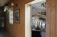 a room with a window with a view of a building at Casa Rural Las Cuevas de Setenil in Setenil