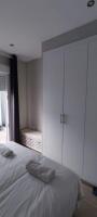 A bed or beds in a room at Guesting Hospital
