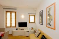 Televízia a/alebo spoločenská miestnosť v ubytovaní Siena UpTown - Sabrina's Cozy Apartment