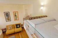 Posteľ alebo postele v izbe v ubytovaní Siena UpTown - Sabrina's Cozy Apartment