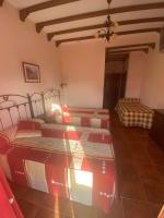 Posteľ alebo postele v izbe v ubytovaní Hotel Meson Fuente del Pino