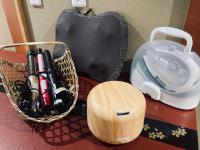 a basket of items on a counter next to a bag at Kyoto Inn Gion The Second in Kyoto