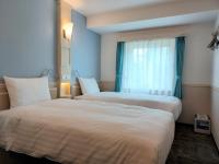Toyoko Inn Changwonにあるベッド