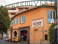 a building with a sign on the side of it at Appartement Sainte-Maxime, 2 pièces, 4 personnes - FR-1-226-500 in Sainte-Maxime
