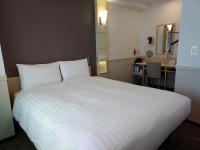 Toyoko Inn Changwonにあるベッド