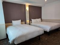 Toyoko Inn Changwonにあるベッド