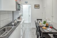 A kitchen or kitchenette at Rhome Guest House