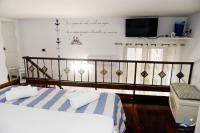 Posteľ alebo postele v izbe v ubytovaní Holiday House Piccirillo
