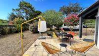 Vonkajšia záhrada v ubytovaní Charmante maison avec annexe - jardin - parking - proche plages