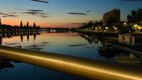 a view of a river at night at Le Vichy Centre, spacieux et cosy T2 avec vue, au calme in Vichy