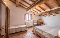 Posteľ alebo postele v izbe v ubytovaní 3 Bedroom Amazing Home In Montalcino