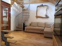 Część wypoczynkowa w obiekcie Appartement dernier étage 3 chambres - Olympe