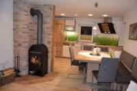 A television and/or entertainment centre at Ferienhaus Christine