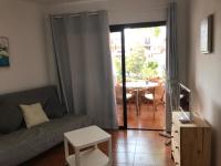 TV a/nebo společenská místnost v ubytování Royal park albatros bonito apartamento Golf del Sur