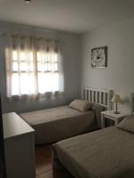 Postel nebo postele na pokoji v ubytování Royal park albatros bonito apartamento Golf del Sur