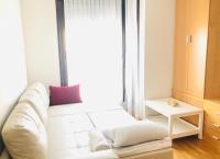 A seating area at Suites Madrid Belfast 13 Ifema AirPort