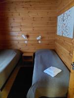 Postel nebo postele na pokoji v ubytování Vierumäki