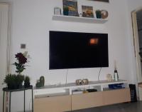 TV a/nebo společenská místnost v ubytování Apartamento con jardín y piscina Pet friendly