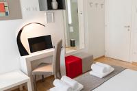 Televízia a/alebo spoločenská miestnosť v ubytovaní B&B Villa Rosa