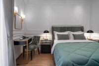Posteľ alebo postele v izbe v ubytovaní Praxitelous Luxury Suites