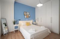 A bed or beds in a room at Exclusive apartment in the heart of Athens
