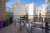 A balcony or terrace at Exclusive apartment in the heart of Athens