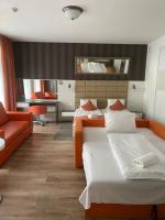 Posteľ alebo postele v izbe v ubytovaní VIP Apartments