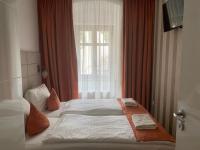 Posteľ alebo postele v izbe v ubytovaní VIP Apartments