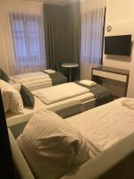 Posteľ alebo postele v izbe v ubytovaní VIP Apartments