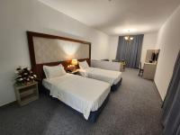 Aquavista Hotel & Suitesにあるベッド