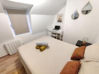 Posteľ alebo postele v izbe v ubytovaní La féline - Duplex - Vieux Valenciennes - Familial