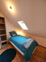 Posteľ alebo postele v izbe v ubytovaní La féline - Duplex - Vieux Valenciennes - Familial
