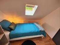 Posteľ alebo postele v izbe v ubytovaní La féline - Duplex - Vieux Valenciennes - Familial
