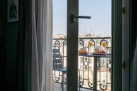 a view of a balcony with a view of a city at Sublim by Sweet Inn in Paris