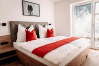 Posteľ alebo postele v izbe v ubytovaní Tanners Chalet Apartments
