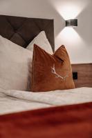Posteľ alebo postele v izbe v ubytovaní Tanners Chalet Apartments