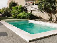 Bazén v ubytovaní L Annexe - Studio avec Piscine Privee alebo v jeho blízkosti