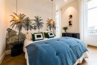 Łóżko lub łóżka w pokoju w obiekcie HYGGE KEYWEEK Apt 2 bedrooms with parking in Biarritz city center