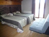 A bed or beds in a room at Casa Rural Ezkibel by clabao