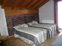 A bed or beds in a room at Casa Rural Ezkibel by clabao