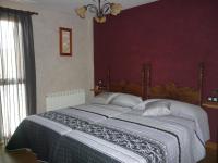 A bed or beds in a room at Casa Rural Ezkibel by clabao