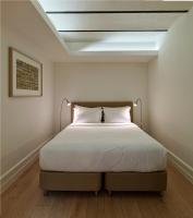A bed or beds in a room at Be Mate Casa Di Bava