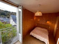 Posteľ alebo postele v izbe v ubytovaní Villa Prairie Mont-Dore 7 Appartements