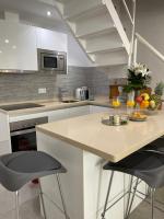 Kuchyň nebo kuchyňský kout v ubytování Duplex con encanto en Paseo Maritimo de Marbella