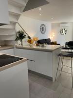 Kuchyň nebo kuchyňský kout v ubytování Duplex con encanto en Paseo Maritimo de Marbella